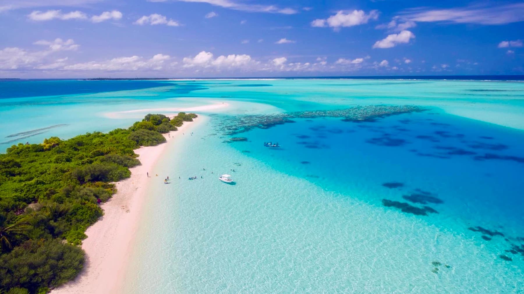 Shallow clear water and a sandbar on the Gulf coast