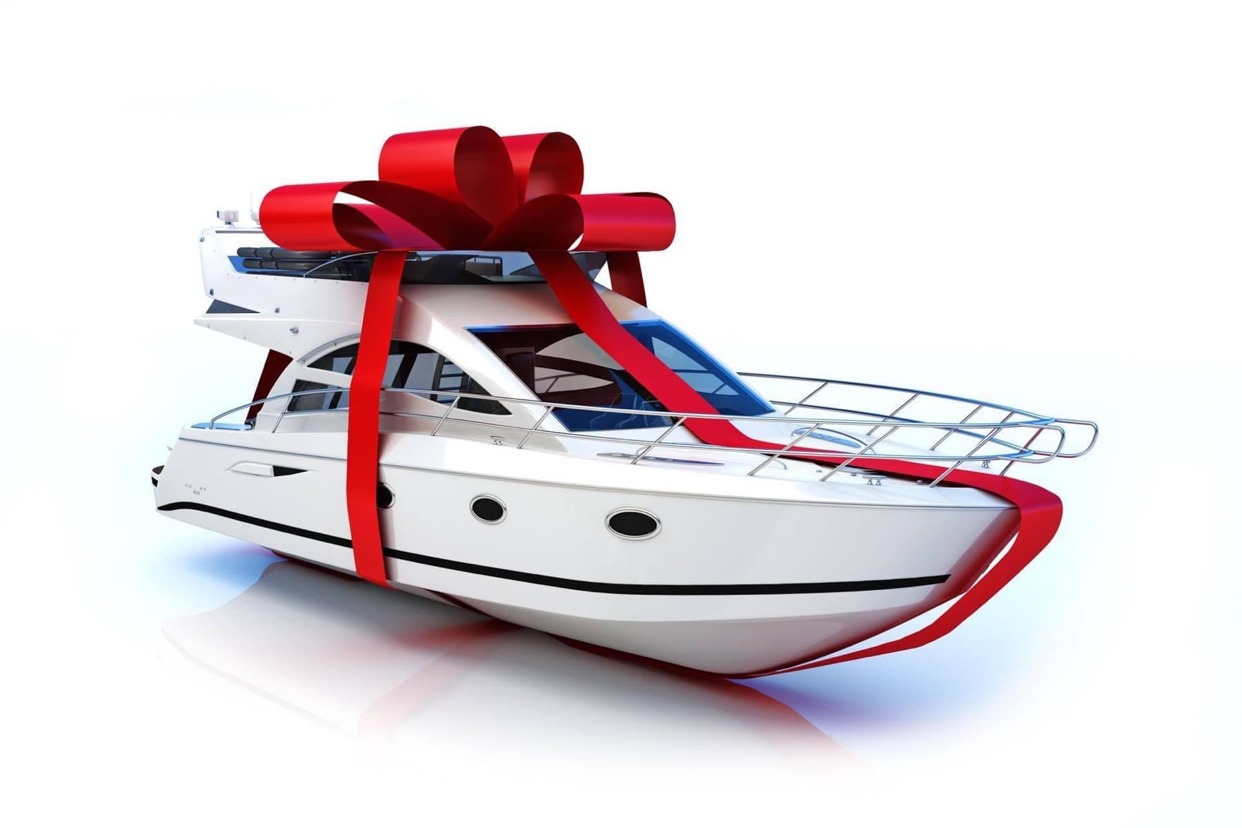 A newly delivered yacht with a large red bow on the foredeck