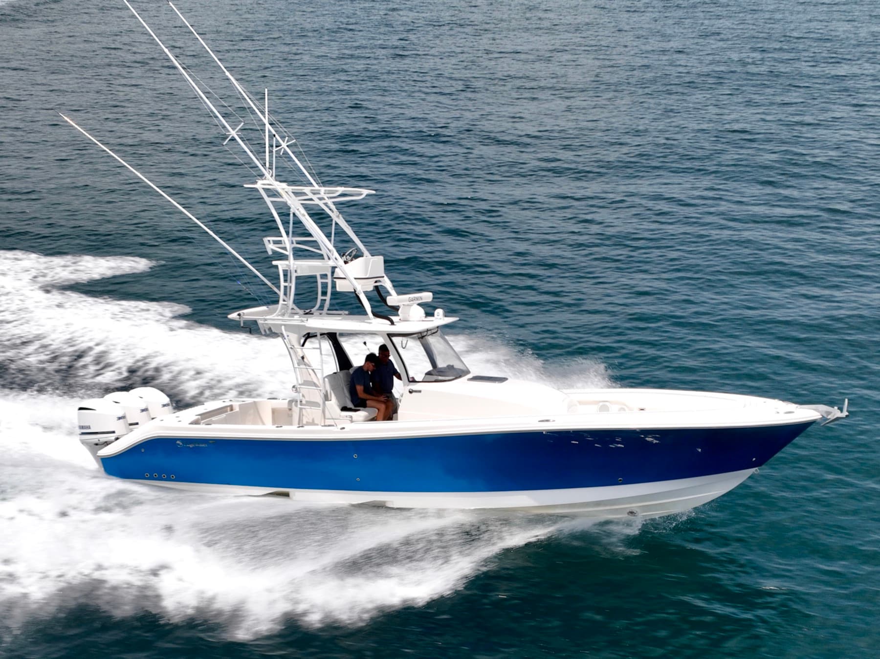 A sportfish convertible running offshore